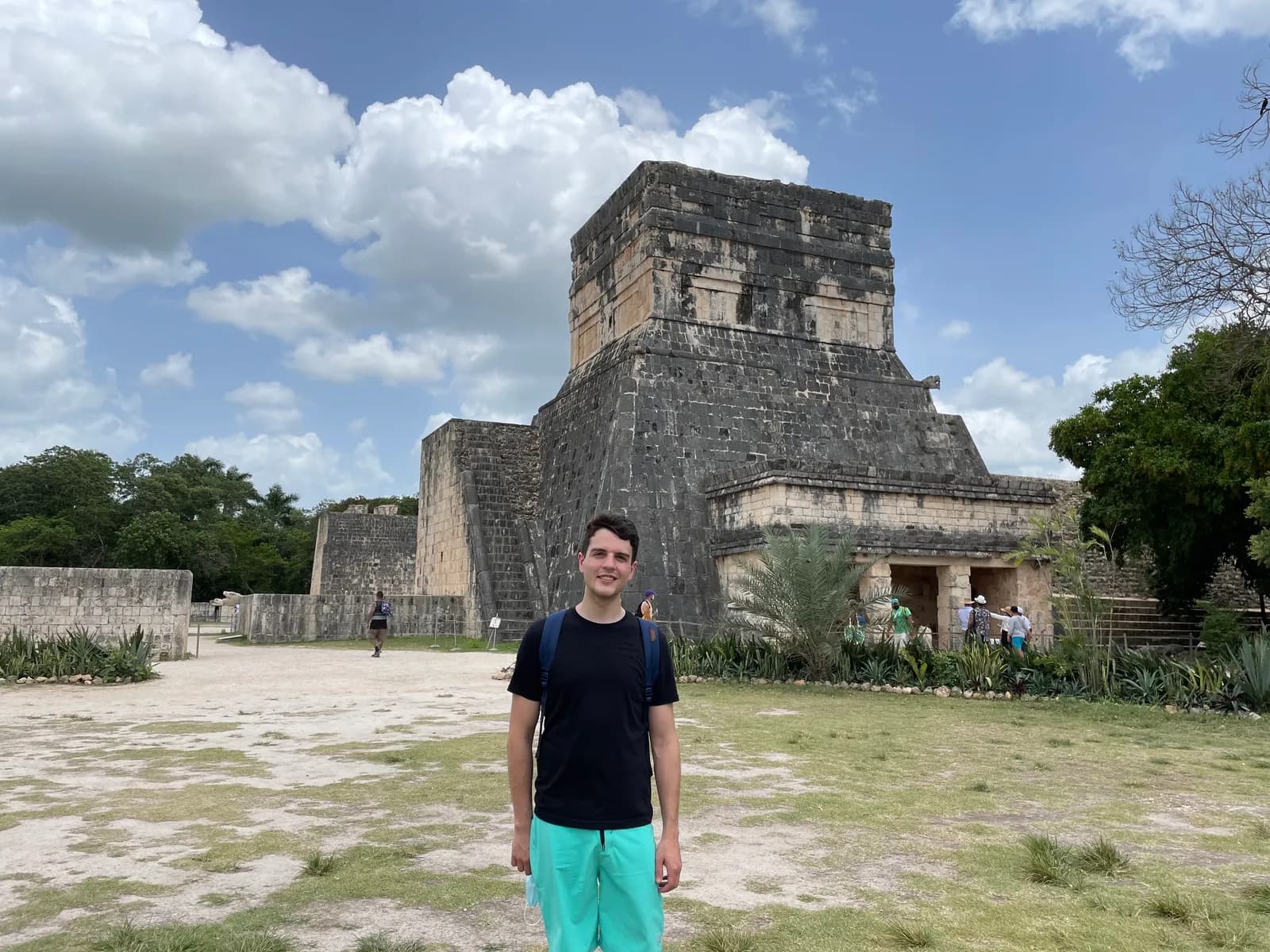 Nick in front of a stepped stone temple